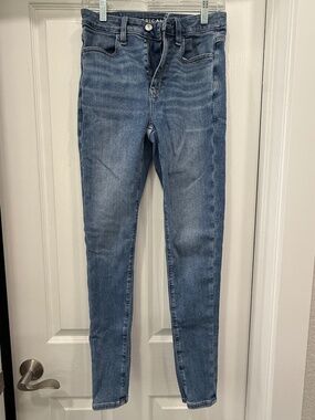 American Eagle Light–Medium Wash High Rise Jegging Next Level Stretch Size 4 Reg